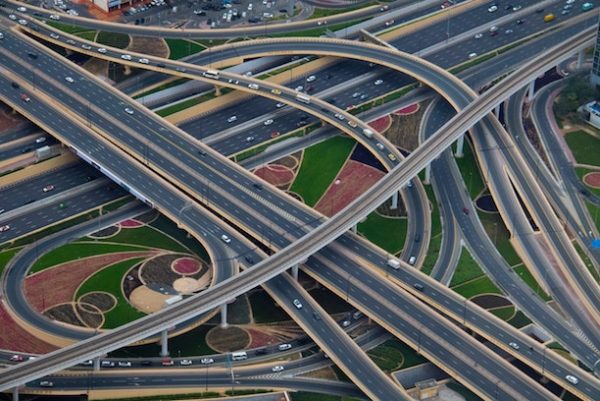 A winding freeway system, overhead shot (probably by helicopter)